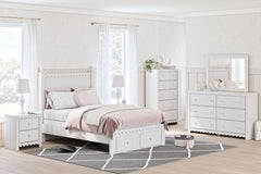 Mollviney - Storage Panel Bedroom Set